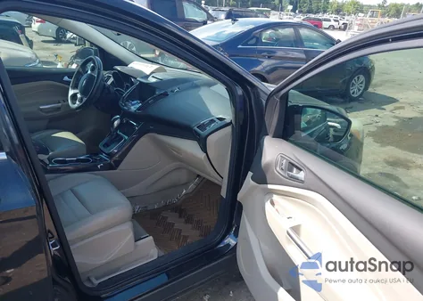 2014 Ford Escape Titanium z USA, uszkodzony, nr VIN 1FMCU0J97EUB49449